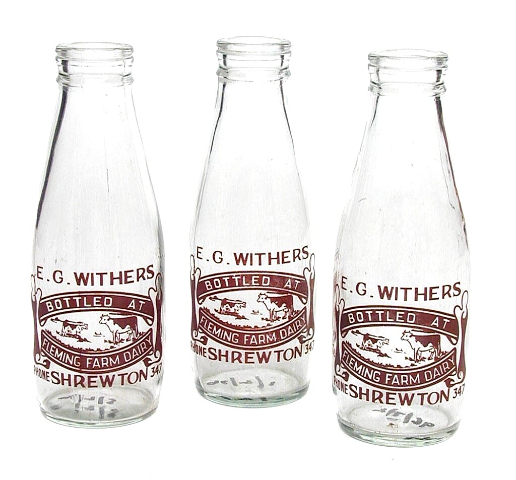 Three glass pint milk bottle