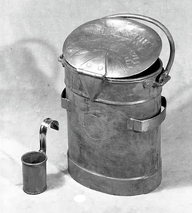metal can with small metal cup with handle for measuring milk